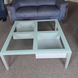 Designer coffee table. Used for approximately 6 months. Move forces sale. Purchased on e bay. Still selling them at £450 Measures 100cm square.