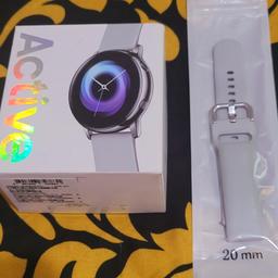 samsung galaxy active watch, in good condition. comes with charger, spare watch strap and box with booklet. Box has a few stains on it but not to bad. check pictures. Thank you