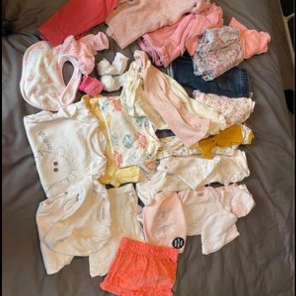 0 to 3 months, baby girl clothes, as you can see in the picture three bodysuits with the accessories, three vests two vest with long sleeves, short, one woolly dress with tight, one woolly dress, one legging, few socks bib , one,woolly jumpsuit, and one dress as you can see in the another picture, a full set dress with the shoes and a half waist coat short sleeves, the other one leg on top and a hoodie that goes on top of it as you can see in the picture Selling baby girl clothes from 3 to 6 months, eight vests, 11 bodysuits some of them comes with the bib gloves hats. One vest with leggings, three cardigans, three going out outfits three T-shirts never been worn one pyjama top and trousers bibs and one slipper as you can see in the picture. The clothes are very good condition Smoke free home message me for more information.