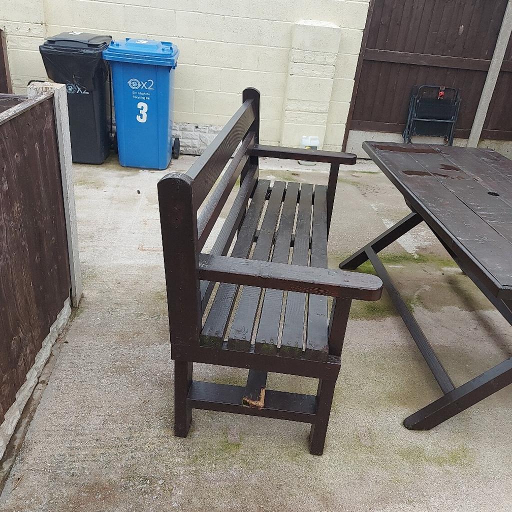 Garden wooden heavy duty outside garden table is 5ft long two benches 5ft long in fair condition been oil wax painted I am in rhyl cash when pick up asking 175 u will need a big van to pick up