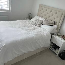 Selling my standard double bed frame(4ft x 6ft) as moving house. Tall divan bed with footframe in a really flattering creamy/beige colour.

Includes hand crafted and pleated 36”tall chesterfield headboard and footframe. Please note this bed does not have any storage built in (like some of the pictures show from the website) I choose mine without. 

Really easy to assemble.

Collection only and must have a vehicle big enough or a van to fit it in as the base is in 2 sections + a headboard