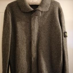 Stone Island Cardigan.
Sized as Junior
Grey.
Excellent condition
Handwash only.
Wool.
From a clean, pet and smoke free home.