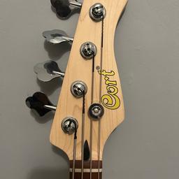 Cort 4 sting electric bass guitar, practically brand new only used a couple of times, comes with a Beatles themed guitar strap and Fender case