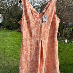 New Next spring summer dress . Apricot dress with pretty white details . New with labels attached was £30. So pretty for the warm weather .