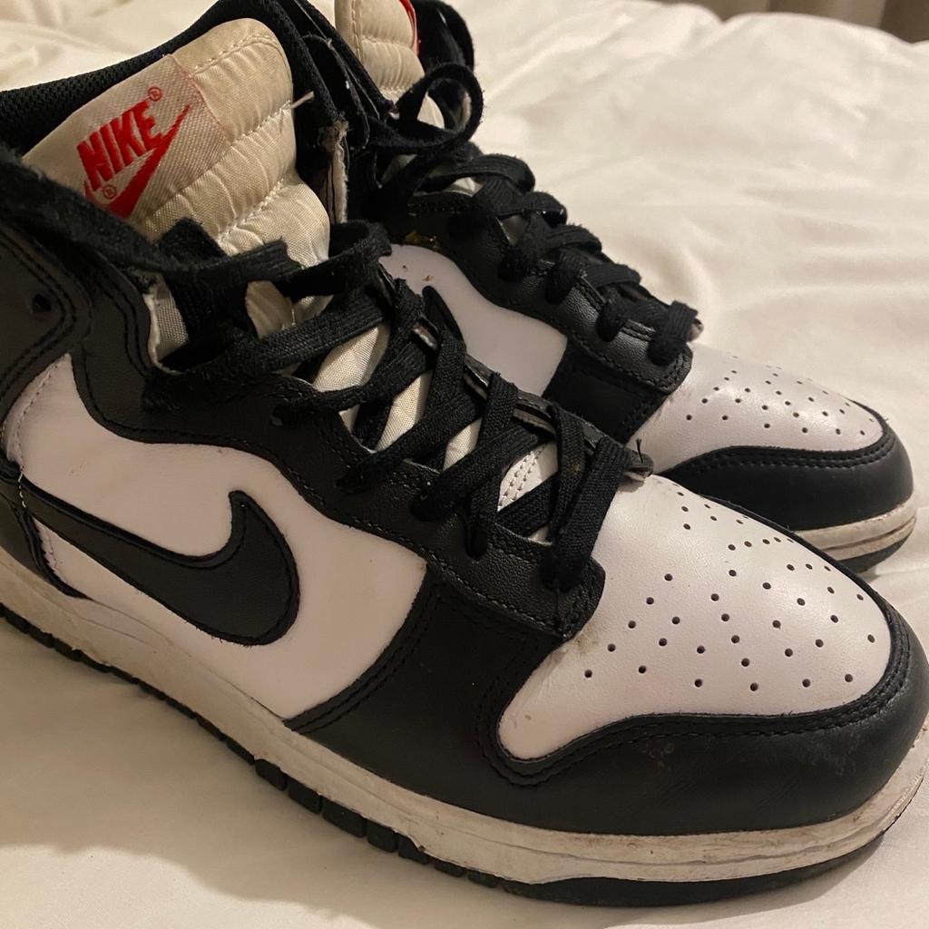Black and white Nike high top dunks. Good condition not creased due to wearing crease protection. Tongue slightly discoloured