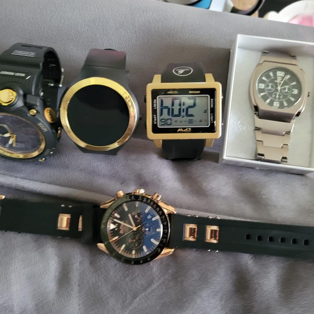 5 mens watches for sale. Barely used. £25 the lot ono. or willing to swap for anything within reason. COLLECTION ONLY