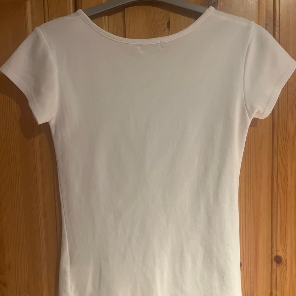 White slogan T shirt, size 8 by Quiz.
Worn but still in good condition.
