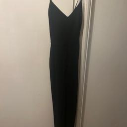 Black jumpsuit to fit size 8 to 10! Long leg and thin straps.