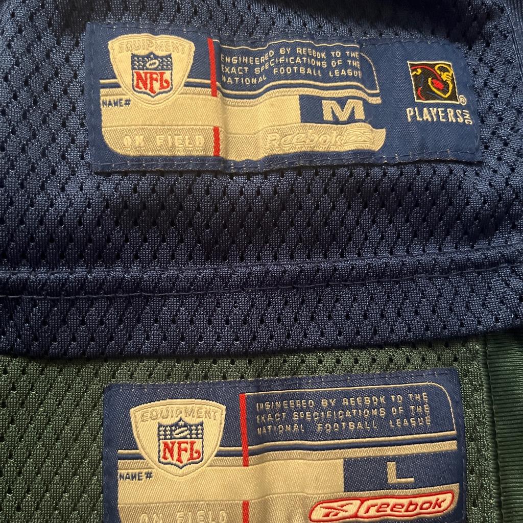 Bundle of 2 Reebok NFL tops and 1 Soccer top.
The 2 NFL tops are well worn with signs of wear on the numbers to the front and back but the red soccer top is in really good condition and is also reversible.
The NFL tops fit a large child or small adult and the soccer top is to fit a small adult.
Selling as a bundle of 3 for £3.50 or happy to sell individually if desired.