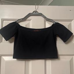 Black off the shoulder crop top, size XS by Motel Rocks. Has been worn a fair bit but has no rips or tears.