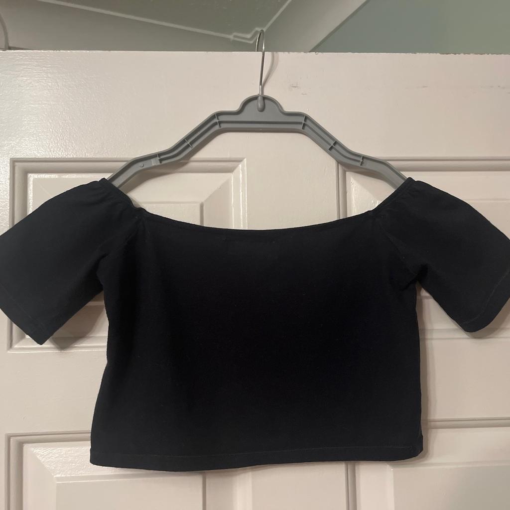 Black off the shoulder crop top, size XS by Motel Rocks. Has been worn a fair bit but has no rips or tears.