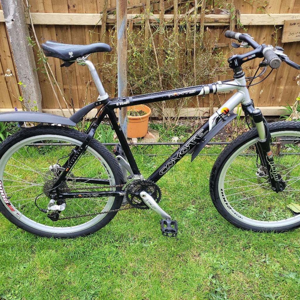 Gents 27 speed coyote ht5 Mountain bike with quick release 26"wheels shimano equipped hydraulic brakes disc brakes double rim wheels e50 monkey bars lock out forks bike is like new no time wasters no courier service no scammers collection only from b783qj