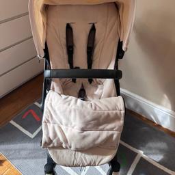 Bugaboo buffalo in good condition. Includes frame, buggy chair, cup holder, rain cover, Seat liner, cream winter muff, adapters.