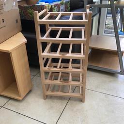 Ikea wine rack 
Beech effect wood 
Holds upto 18 bottles