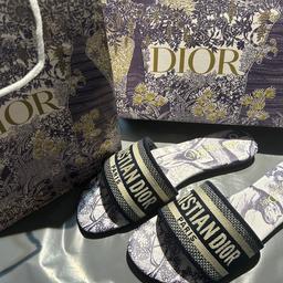 Brand new 
Dior animal print sandals 
Brand new 
Top version with the embossed logo on the sole, 

Comes with box and shopping bag
Size uk 7 

Also have another design in size 6 please see other listings 

Will be packed securely