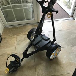 Powakaddy FW5 electric Golf trolley.

Powakaddy FW5 electric golf trolley complete with genuine Powakaddy 18 hole lithium battery & charger. In excellent used condition.
Storage/carry bag included