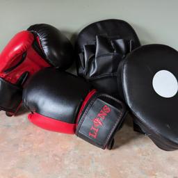 Sparring Set, boxing gloves and pads
Also comes with inflatable punch bag that you can put water in the base of to hold it in place better

in good condition as we've never really used it