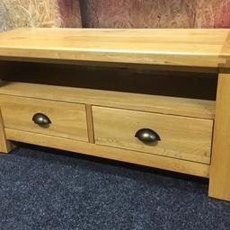 Solid oak TV stand by Willis & Gambier fine furniture. A really heavy piece of quality furniture built to last. With 2 x solid storage drawers inside. The unit measures 110cm long x 40cm deep x 50cm tall. Viewing/collection is Leeds LS24 & delivery is available if required - £150