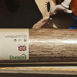 x10 rolls unopened natural wood patterned paper. give the illusion of being in a log cabin room with silverish metallic touch to it nice paper I moved and don't need to decorate where I am living now I paid £15 a roll from dunelm will sell £10 a roll and will split if needed