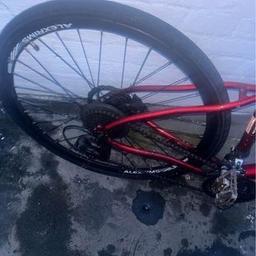 2nd hand pinnacle maroon red nice bike all works as it should.. front tyre puncture