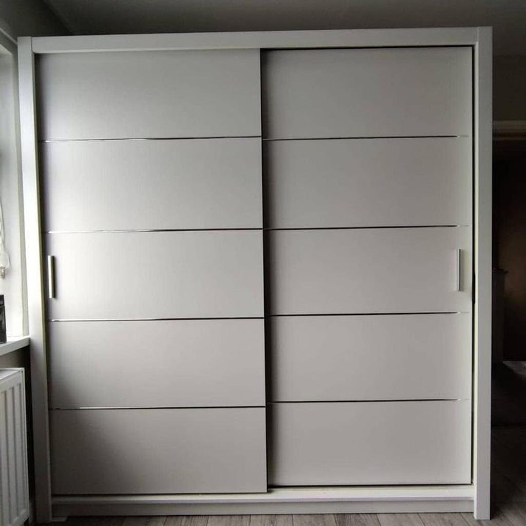 Brand new sliding doors wardrobe in different sizes and colors

Colors:
White
Grey
Black
Oak
Sizes:
100cm £230
120cm £250
150cm £280
180cm £290
203cm £320
250cm £420
Cash on delivery
Fitting service available extra charges apply
Whatsapp: (07752286680)