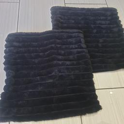 2x black fur ribbed cushion covers new never used