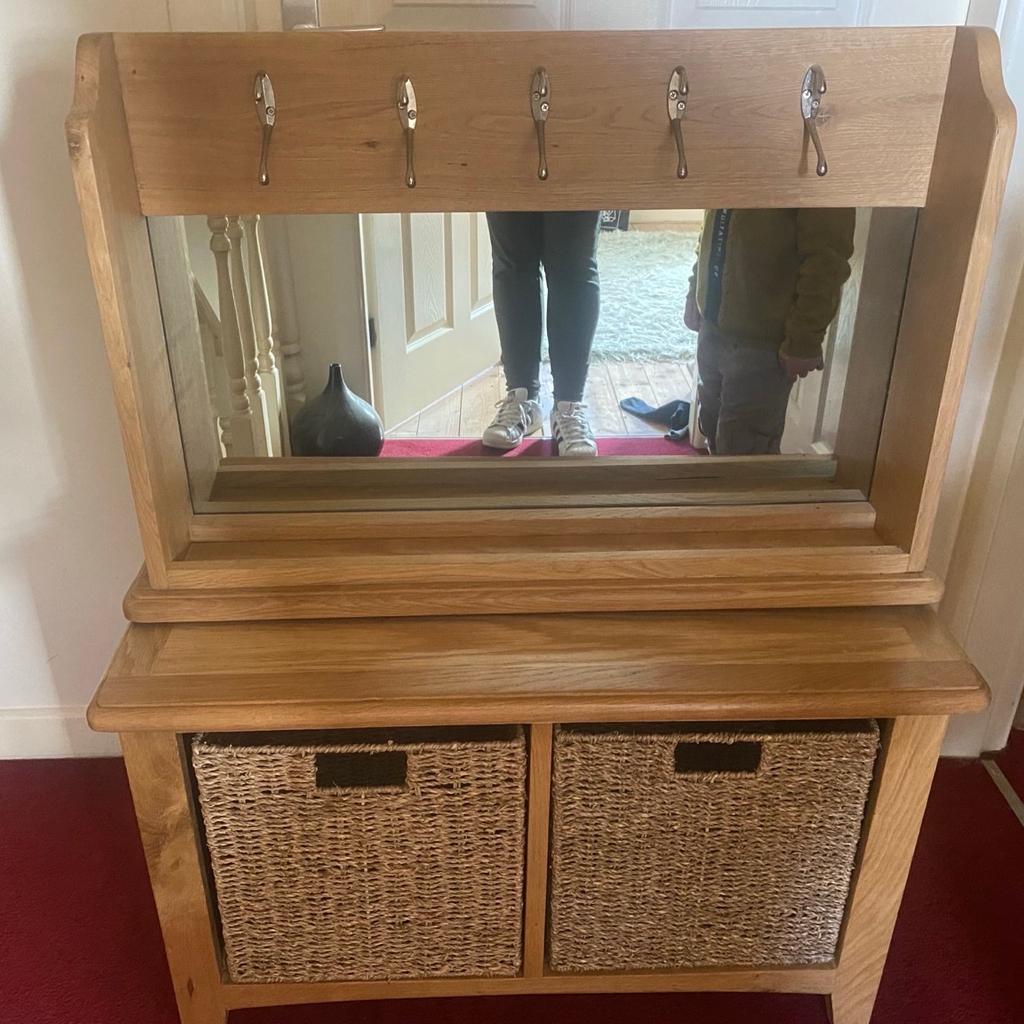 Wooden unit with two deep drawers and a matching wall mirror with coat hangers on

Brilliant condition

£100 Ono

Cannock collection only