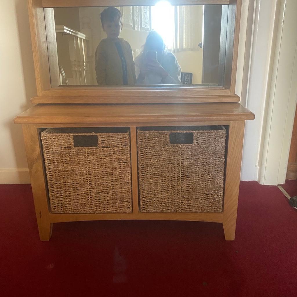 Wooden unit with two deep drawers and a matching wall mirror with coat hangers on

Brilliant condition

£100 Ono

Cannock collection only