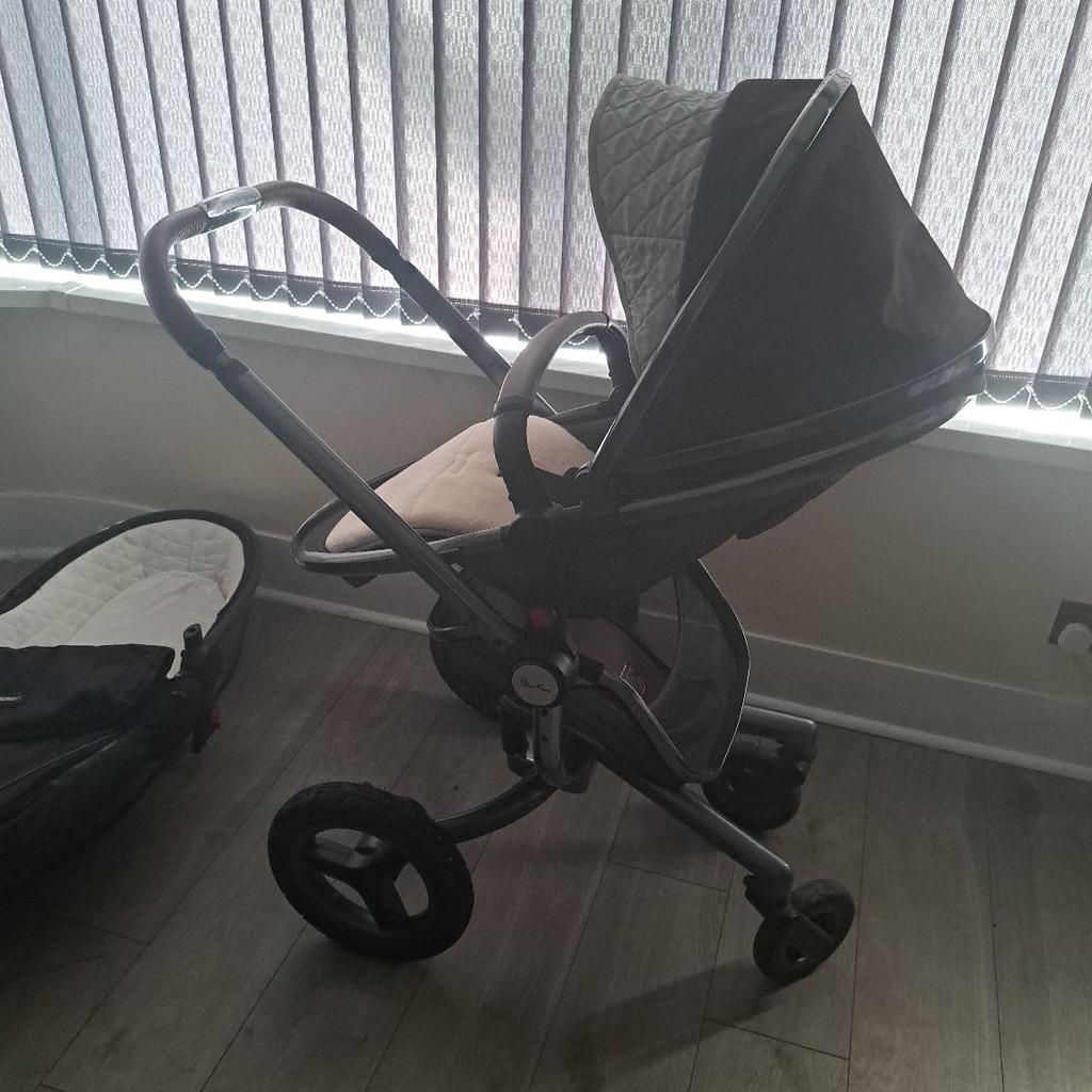 silver Cross limited edition pram set excellent condition comes with foot muff , rain cover , matching silver Cross bag which also goes onto pram selling cheap as got another couple signs of scratch on handle and minor in frame but other then that it's great bargain