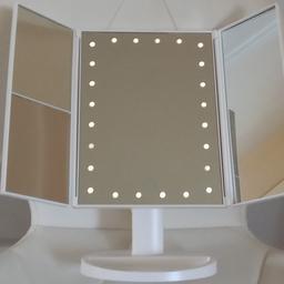 24 LED Touch Makeup Mirror, with 2x & 3x Magnification.

180-degree swivel design with storage tray.
Folds for storage.

Can be battery operated (4x AA) or USB powered. The USB cable has never been used.

Size H28.5, W18, D12cm.

The mirror is in good working condition, with original packaging. The box has storage wear.
(as shown in picture)

Selling as no longer need.