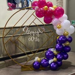 Gold party decor backdrop, balloon stand. Balloons and sign not included.