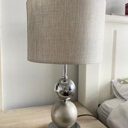Table lamp, works perfectly. Only selling due to being too large for bedside table. 
45cm high and 25cm diameter. 
Switch to turn on located at the top. 
Collection from B9 

If advertised, it’s still available.