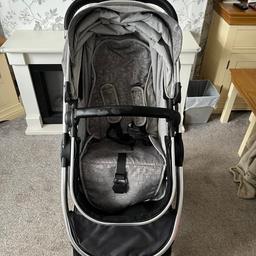 Complete travel system from baby to toddler. 
Car seat which fits onto wheels
Pram / carrycot which converts into pushchair
Carrycot mattress 
Easy folding system 
Adjustable handle height
Bumper bar
Good size shopping basket 
Adjustable seat incline/ recline
Carrycot cover
Foot cover 
Rain cover 
Matching bag
Snooze shade
Instruction manual