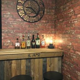 Handmade rustic wooden bar. Has only been used for show with some bottles stood on it in the mancave. Has a hollow back.

Bar Dimensions - 110cmW x 103cmH x 42cmD

2 New black metal bar stools . Again have only been used for show infront of the bar. Currently retailing at £39.99 on Amazon.

Stool Dimensions - 71.5cmH x 42cmW

❗️Collection only please as it’s too big to fit in my car❗️
