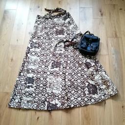 Vintage Handmade Wrap Skirt, maxi in length. Made of cotton, fully lined. Quirky African Masks pattern. Would fit up to UK Size 16, total length 40 inches. Beautiful shades of chocolate brown, yellow and tan 💌 sent via recorded delivery 💌 #vintage #wrap #skirt #maxi