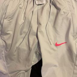 Nike pro dri fit Bottoms White/grey and Pink pro level worn by proffessional footballers in training size Medium only worn once don’t fit open to offers