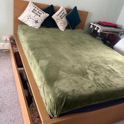 A clean design with solid wood veneer. Place the bed freestanding or with the headboard against a wall. You also get spacious four storage boxes that roll out smoothly on castors. 
Very good condition king size bed with four drawers and from ikea,