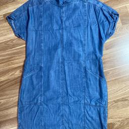 Next light weight denim dress perfect for summer comes about  just below knee length. Depending how tall. Smoke and pet free home