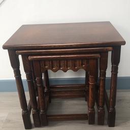 A nest of 3 oak side tables in good condition . Can deliver if local.