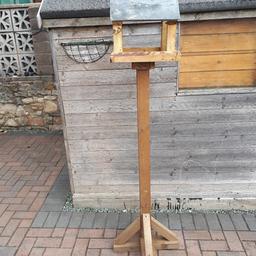 Bird table 6ft tall with slate roof. The top lifts off for transport. Robust and sturdy fixed with screws ready for staining £30