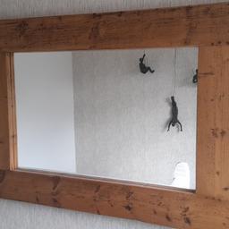Large solid wood mirror.
86cm x 119cm(34"x47")
hanging brackets on back.
1 corner of frame has a slight split but still solid 
collection from Wythenshawe.