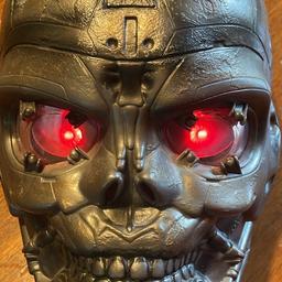 Reluctant Sale. 😔 Nice piece of nostalgia for any true Terminator fan like I. 🎥 Iconic film and this mask was part of my memorabilia collection. This is the higher end mask. Incorporates unique flashing red lights and  sound. 🎦 Wife now says it has to go! Can also be utilised as show piece or fun party addition. Cost silly money when new. Cheap for quick sale. 💀 Prefer Cash on Collection. However may consider local delivery for mileage.
