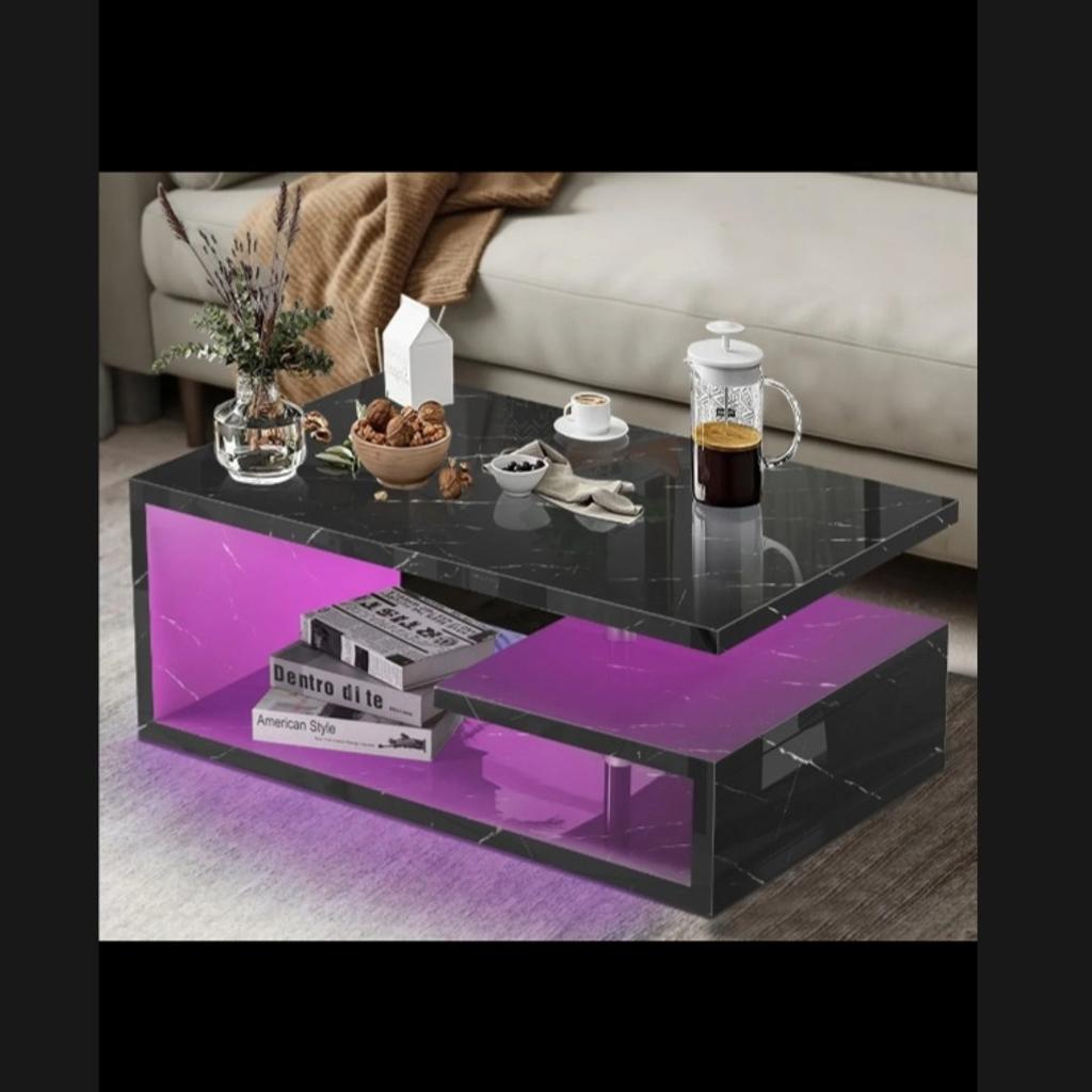 Add a modern touch to your living room with this stunning White High Gloss LED Coffee Table. With a tabletop made from MDF and a high gloss finish, this rectangular-shaped table is built to last. It also features RGB LED lights to enhance the overall look of the table.This Coffee Table is perfect for indoor use and comes with storage, making it a great option for keeping your living room tidy. It requires assembly and comes with a 1-year manufacturer warranty.