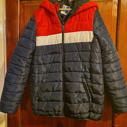 Boys coat. Good condition. Tear in the inside lining at the top but can be easily sewn.