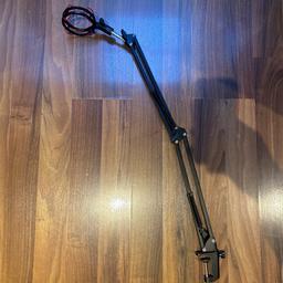 Microphone desk arm with clamp.

Like new, can be adjusted to many heights.