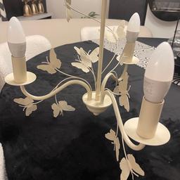 Cream metal butterfly 3 light chandelier from Dunelm
In excellent perfect working order ceiling light
Diameter 40cm length 34cm
Collection only
Smoke and pet free home