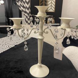 Dunelm 3 arm jewelled candelabra in cream 
New with tags was bought to go with lamp/ light in other listing but never used
35cm in height
32cm in width
Collection only 
Smoke and pet free home