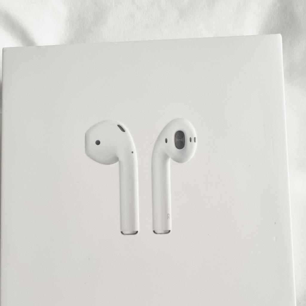 Brand new Apple Airpods, charger and charging case included, box has been opened but not used, please see pics