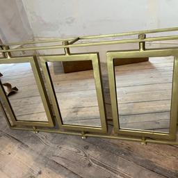 Enhance the elegance of your home décor with the Tribeca Triple Mirror in Brass. This magnificent wall mirror comes with a rectangular shape and a frame finished with aged brass. The mirror is mounted on the wall and features a size of 91 cm in width and 47 cm in height. The brand behind this masterpiece is Atkin&Thyme, renowned for their exceptional quality products.

This wall mirror is perfect for home decoration and will look stunning in any space, from the living room to the bedroom. The mirror's frame is made of brass, which is known for its durability and resistance to corrosion. The Tribeca Triple Mirror in Brass is sure to add a touch of sophistication to your home décor.