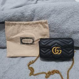 GG Marmont Mini Matelasse Leather Crossbody bag.

Measurements: 21cm wide x 12cm high x 5cm deep

Unwanted gift.
New, never used. comes with Gucci Dust bag.